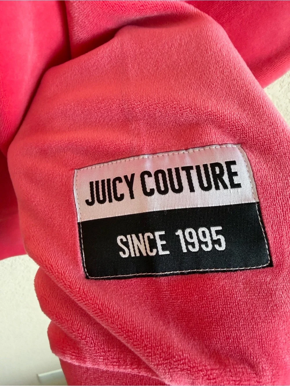 Juicy Couture that coral